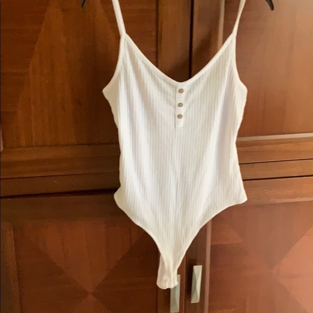 One piece white bodysuit